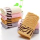Manufacturer wholesale bamboo fiber towels, tiger-print thickened 110g face towels, wholesale gifts, bamboo charcoal fiber towels.