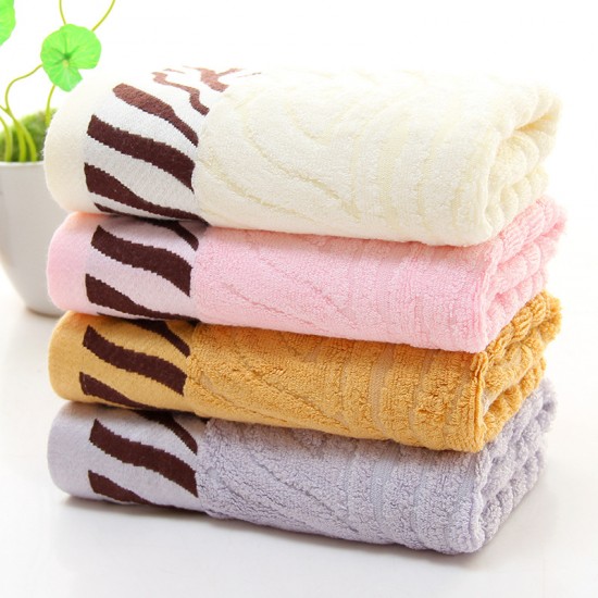 Manufacturer wholesale bamboo fiber towels, tiger-print thickened 110g face towels, wholesale gifts, bamboo charcoal fiber towels.