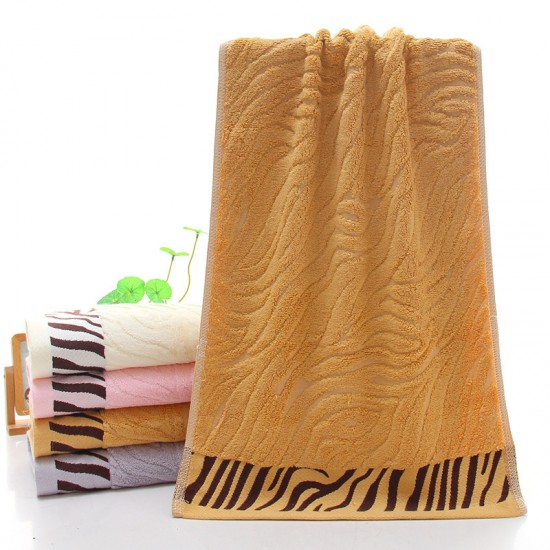 Manufacturer wholesale bamboo fiber towels, tiger-print thickened 110g face towels, wholesale gifts, bamboo charcoal fiber towels.