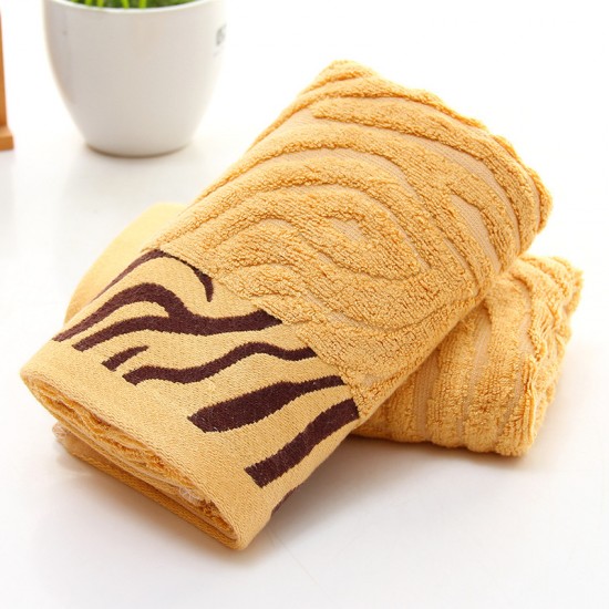 Manufacturer wholesale bamboo fiber towels, tiger-print thickened 110g face towels, wholesale gifts, bamboo charcoal fiber towels.