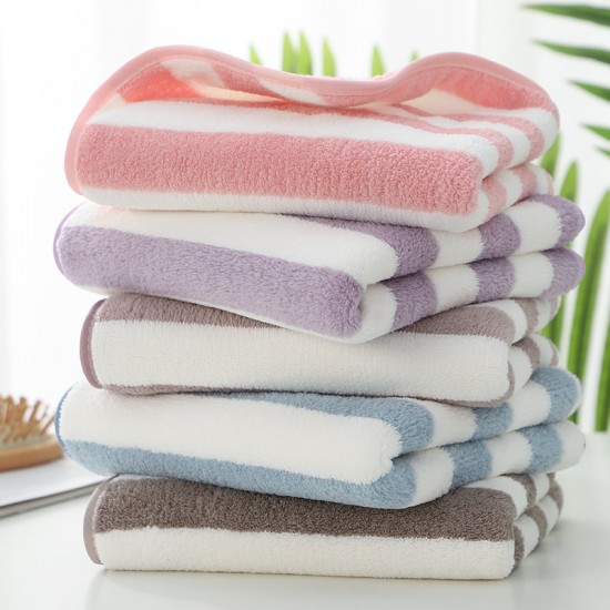 Manufacturer wholesale warp-knitted, high-density coral fleece towels for face towels with logos, available as gifts for foreign trade.